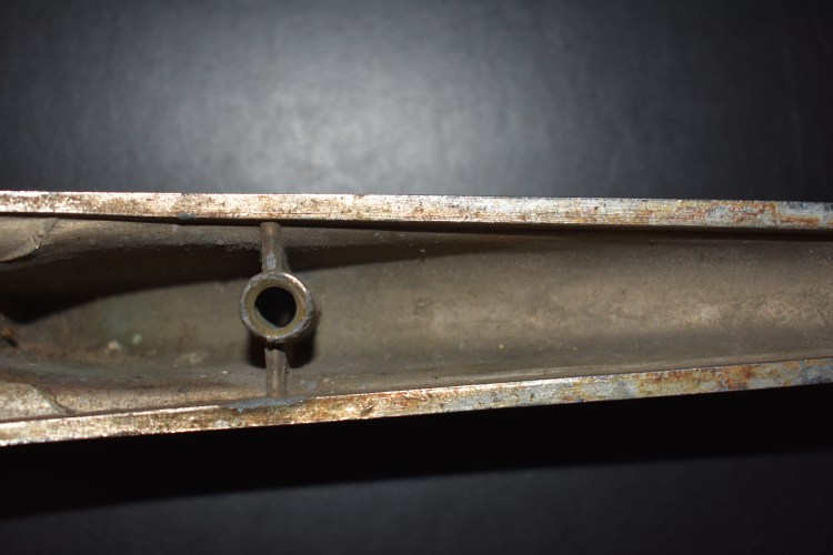 Series 65 Silver Bomber Hood Ornament Cast mark 1.JPG